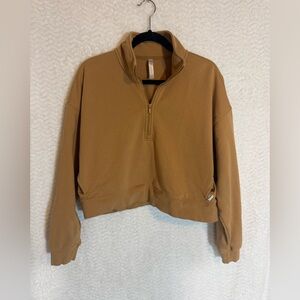 Fabletics Tan Pullover. Size roomy medium. Unique one 🧡
